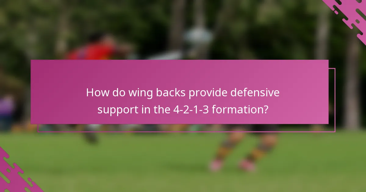 How do wing backs provide defensive support in the 4-2-1-3 formation?